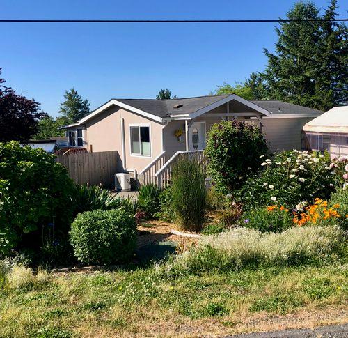 Front of house and front flower garden.