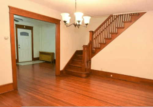 Gorgeous, restored original hardwood floors and staircase