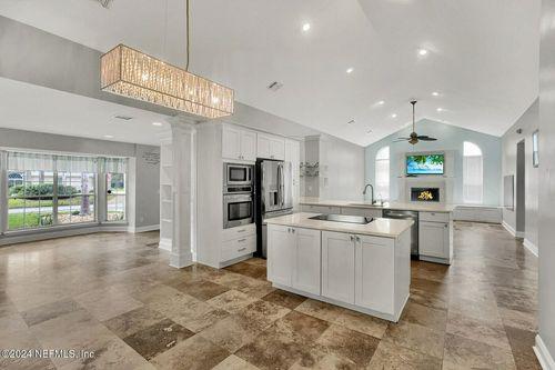 Open concept, Travertine tile throughout