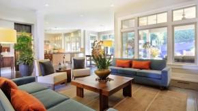 Well staged living room with flowers