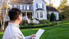 Man evaluating a home for sale