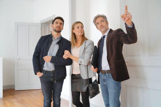 Couple looking at potential new home.