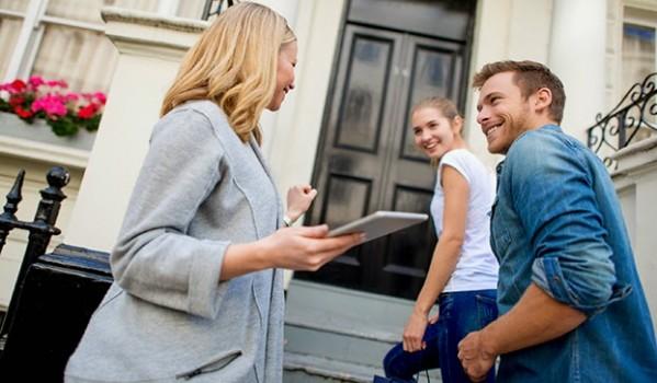 Young couple looking at homes