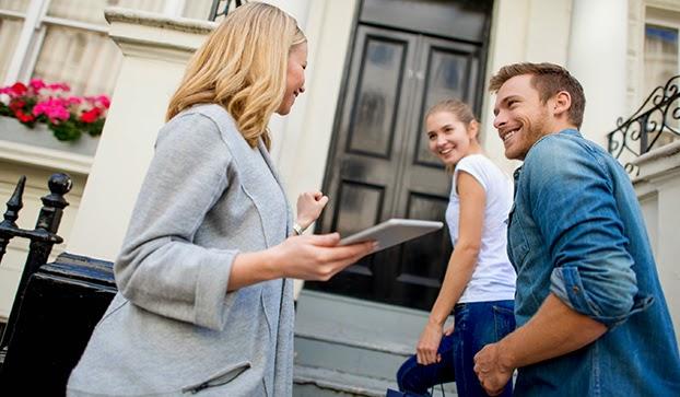 Young couple looking at homes